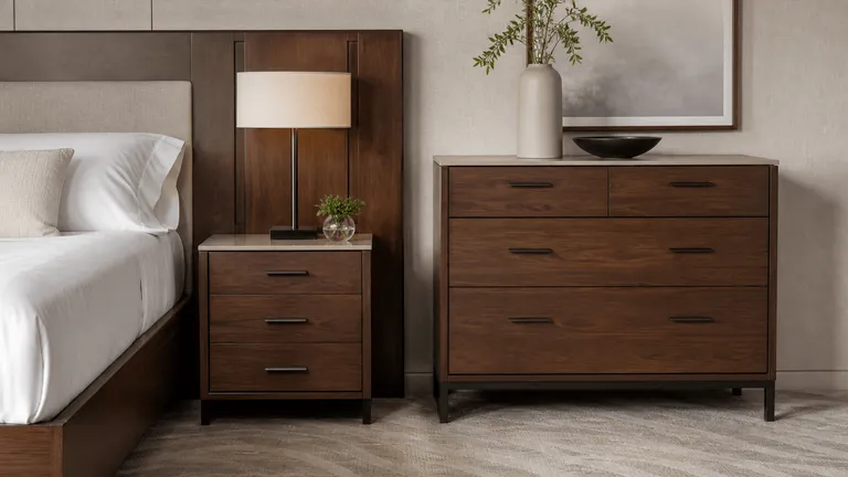 Walnut veneer hospitality casegoods in a neutral hotel interior
