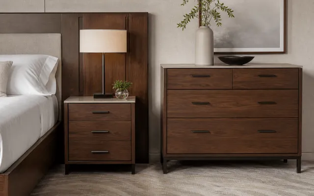 Walnut veneer hospitality casegoods in a neutral hotel interior