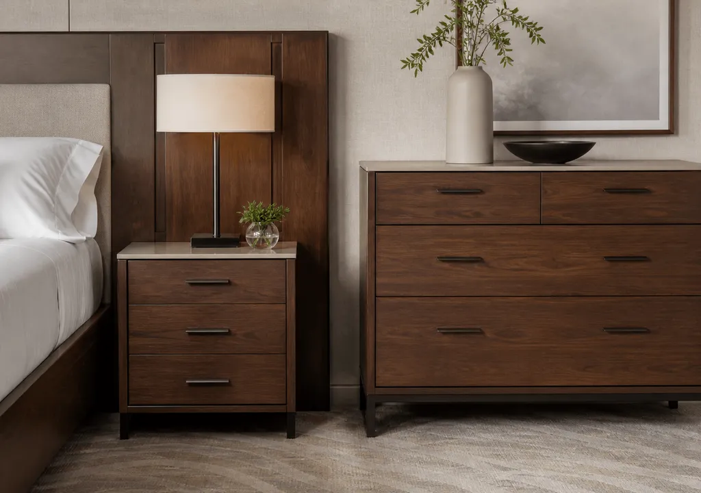 Walnut veneer hospitality casegoods in a neutral hotel interior